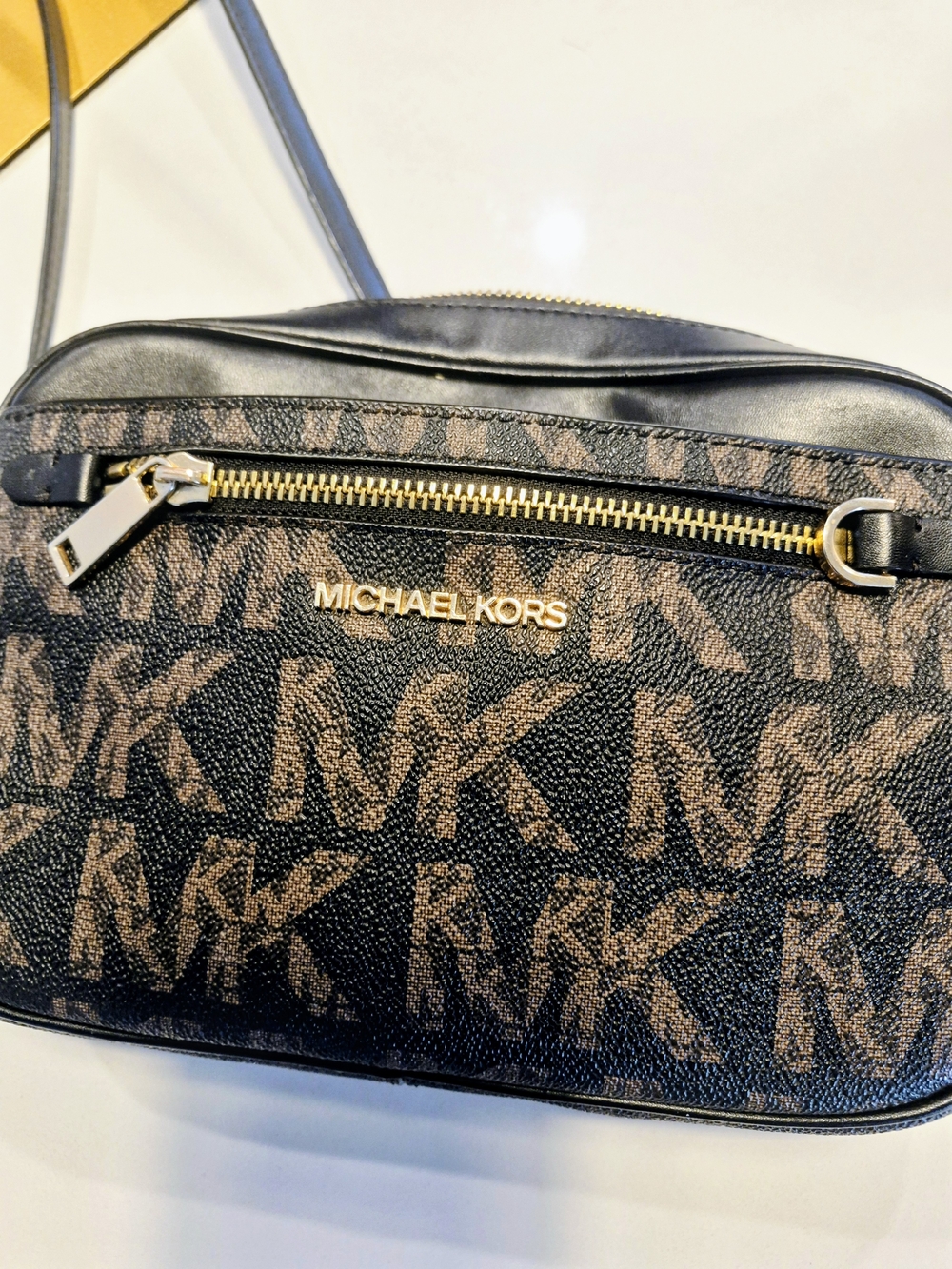 Michael Kors Jet Set Large Logo Crossbody Bag featuring a graphic MK monogram